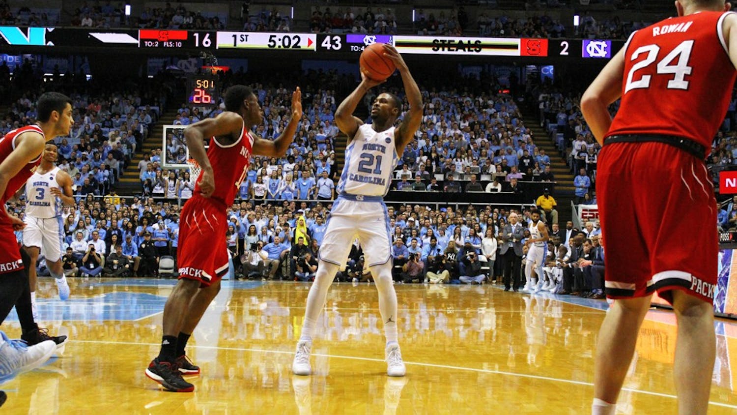 North Carolina guard Seventh Woods (21) attempts a shot against N.C. State on Jan. 8. He has cut down on his turnovers during ACC play.