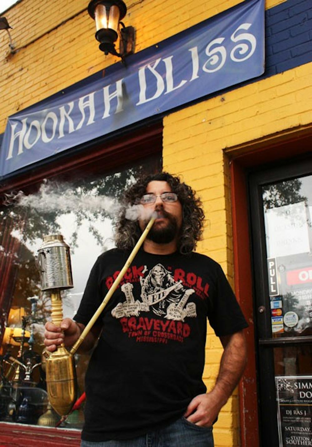 Adam Bliss first opened Hookah Bliss as a bar and will have to make changes to stay open. DTH/Daixi Xu