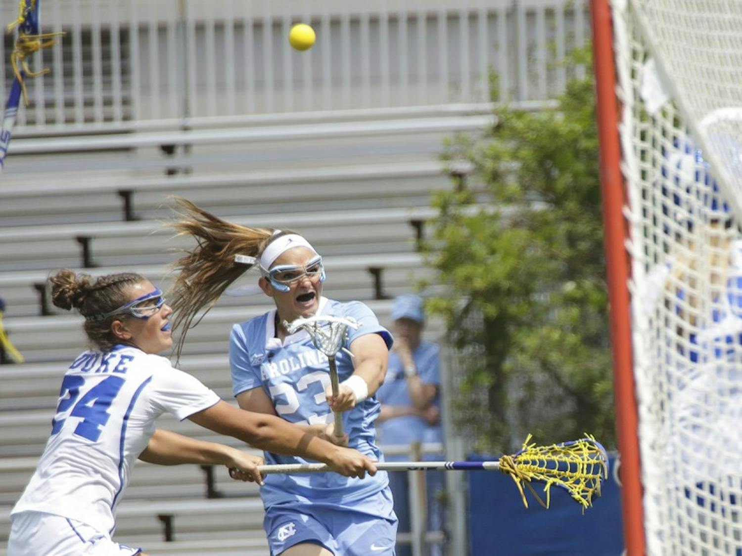 North Carolina women's lacrosse team attacker Molly Hendrick&nbsp;shoots against Duke on April 22. Hendrick finished with a career-high seven goals in both this game and UNC's ACC&nbsp;Tournament championship win against Syracuse.