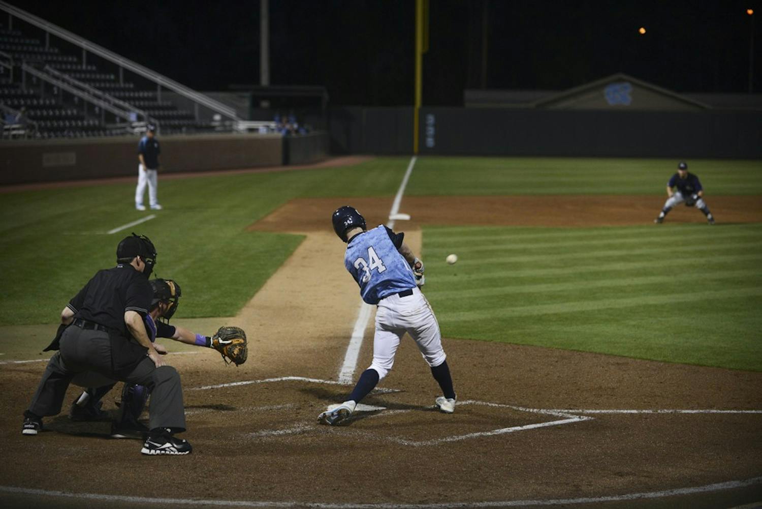 UNC freshman Brian Miller (34) rips a solid line drive to left field in Tuesday's game against High Point.