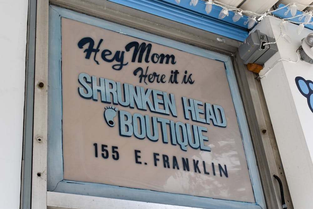 The sign over Chapel Hill's Shrunken Head Boutique's front-door is pictured on March 3, 2022.