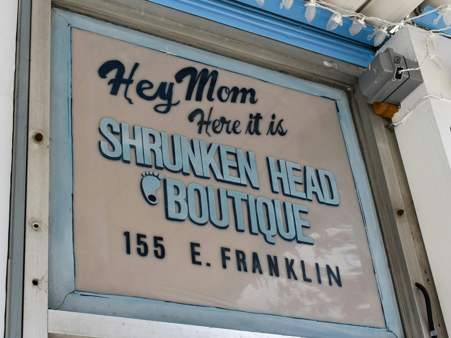 The sign over Chapel Hill's Shrunken Head Boutique's front-door is pictured on March 3, 2022.