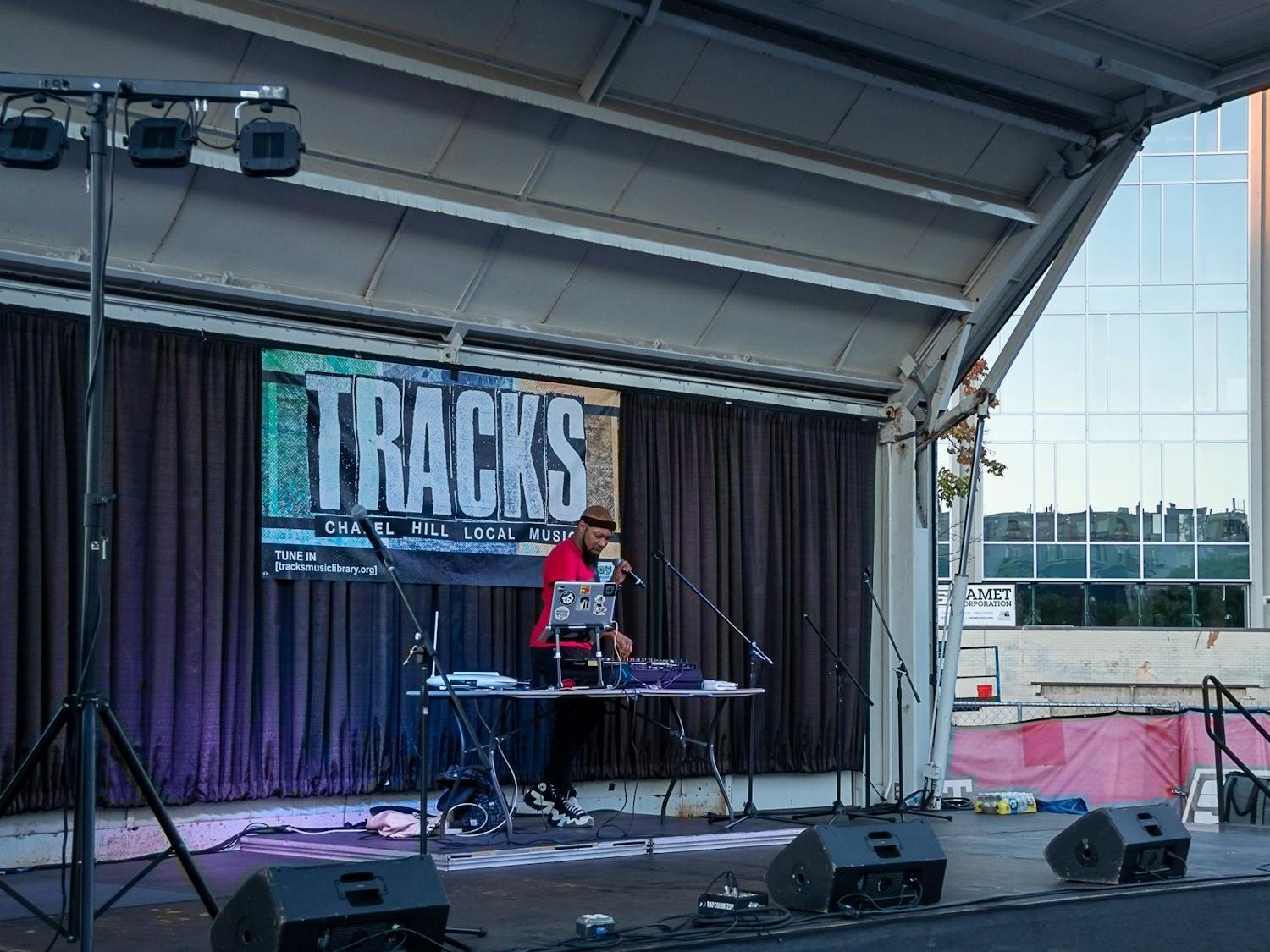 VSPTRN, a DJ and producer from Durham, performing at the Tracks Music Series concert in Chapel Hill, N.C., on Thursday, Sept. 8, 2022. VSPTRN is known for infusing hip-hop, techno deep house, and afrobeats into their DJ style.