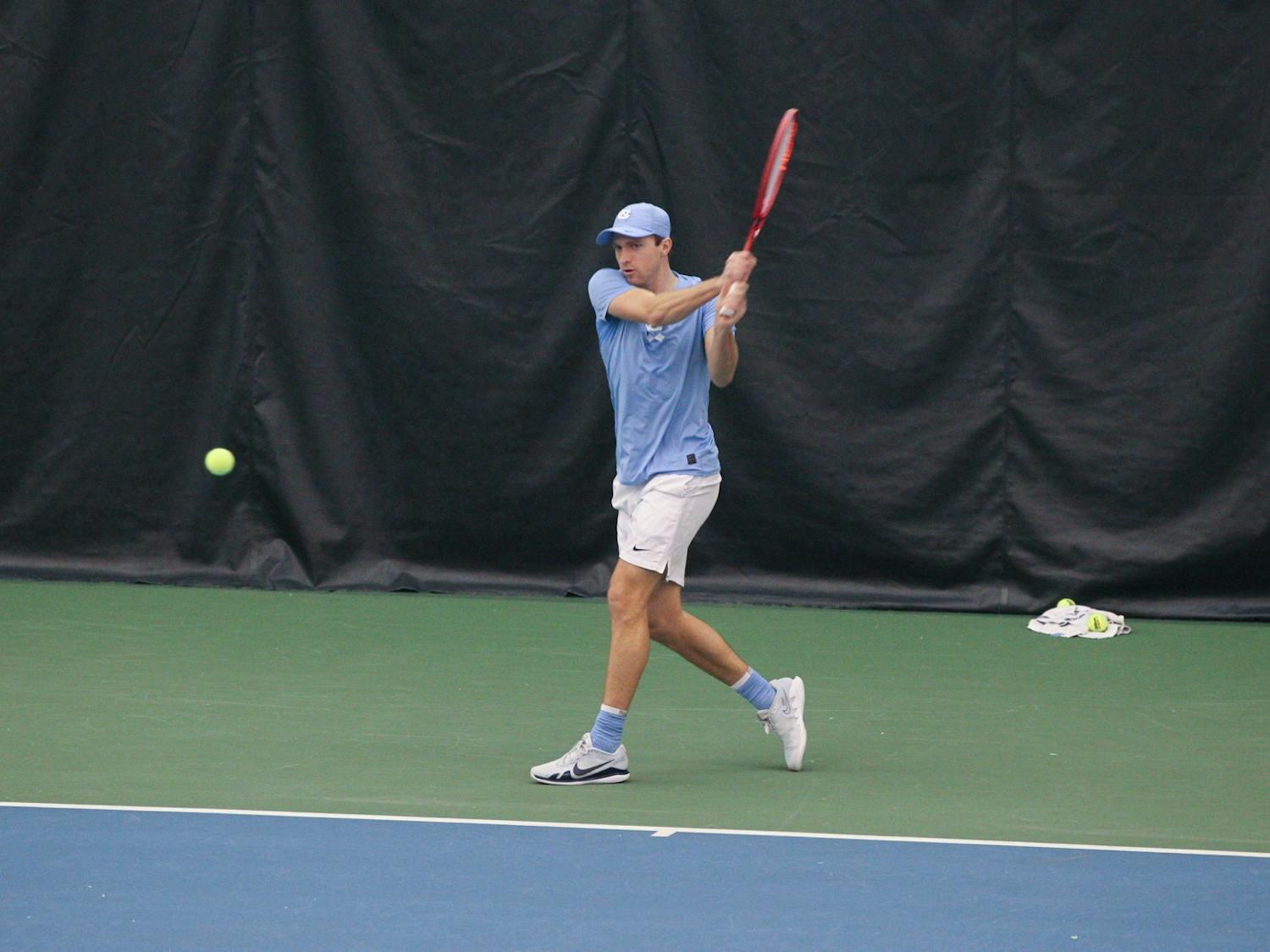 UNC senior Brian Cernoch returns a volley during the Tar Heels’ 4-2 victory over South Carolina in the Cone-Kenfield Tennis Center on Feb. 13, 2022.