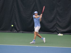 UNC senior Brian Cernoch returns a volley during the Tar Heels’ 4-2 victory over South Carolina in the Cone-Kenfield Tennis Center on Feb. 13, 2022.