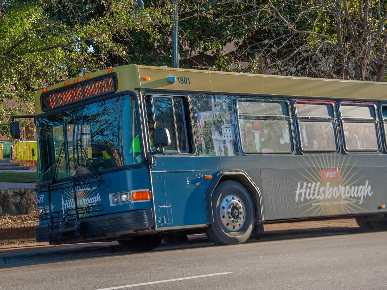 The U bus stops at Franklin Street on February 23, 2021. Chapel Hill Transit recently installed new stops and coverings for their buses.