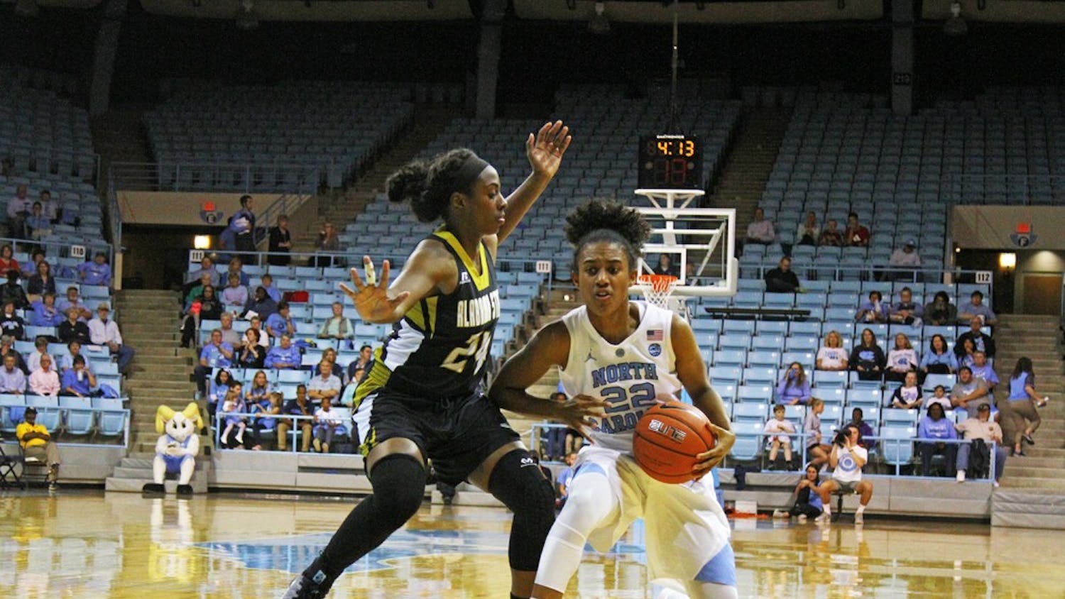 Paris Kea (22) drives the ball forward in the game against Alabama State on Friday.