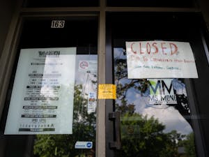 Ms. Mong restaurant's front door and "Closed" sign on Thursday, Aug. 20, 2020. Ms. Mong is one of the multiple businesses on Franklin Street that have closed due to health concerns surrounding the COVID-19 pandemic.