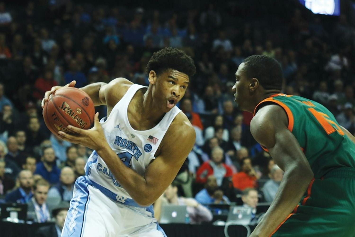 North Carolina forward Isaiah Hicks (4) worked on a Miami defender in the quarterfinals of the 2017 ACC Tournament in Brooklyn.&nbsp;
