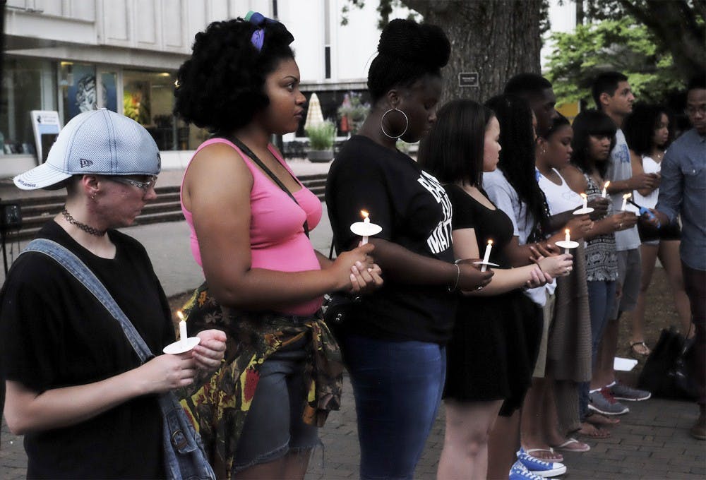 Nine candles are lit in remembrance of those lost in the Charleston church shooting. This took place at the vigil on June 19th.  