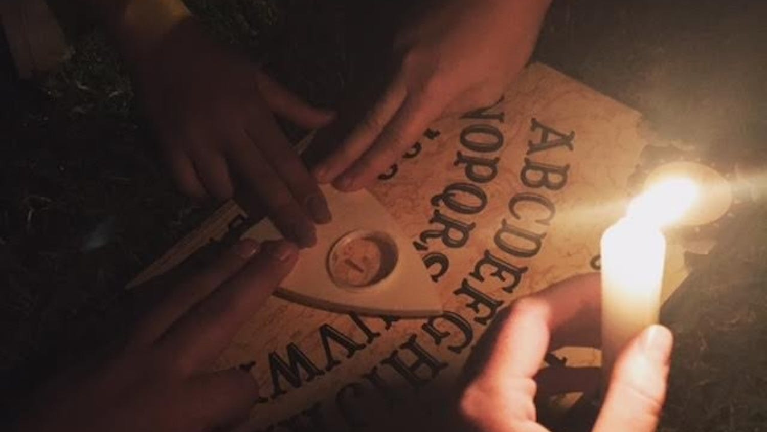 Noni, with friend RJ and fellow DTH staffers Alice and Jenni, took a Ouija board to Gimghoul Castle to see if it really is haunted.