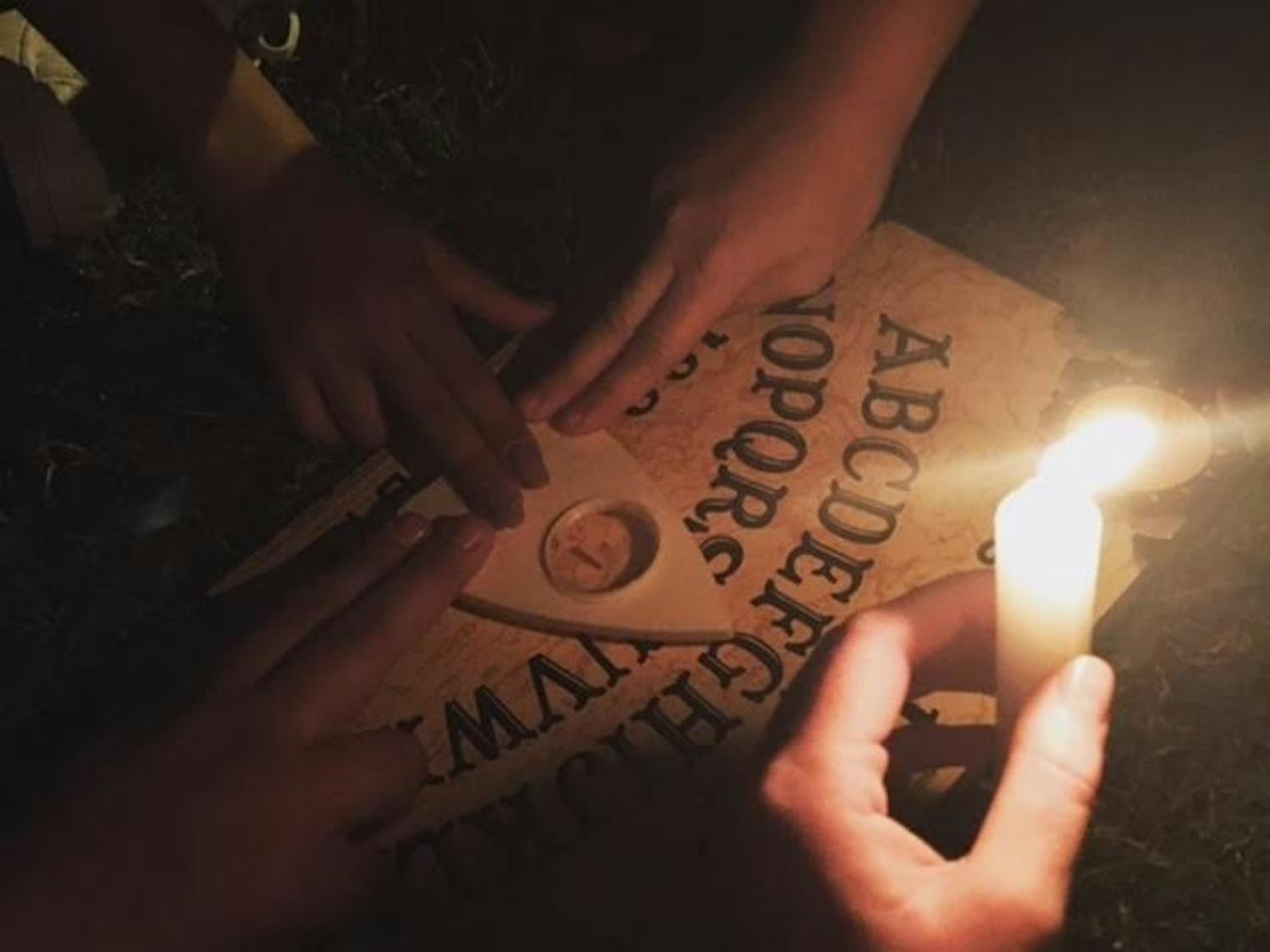 Noni, with friend RJ and fellow DTH staffers Alice and Jenni, took a Ouija board to Gimghoul Castle to see if it really is haunted.