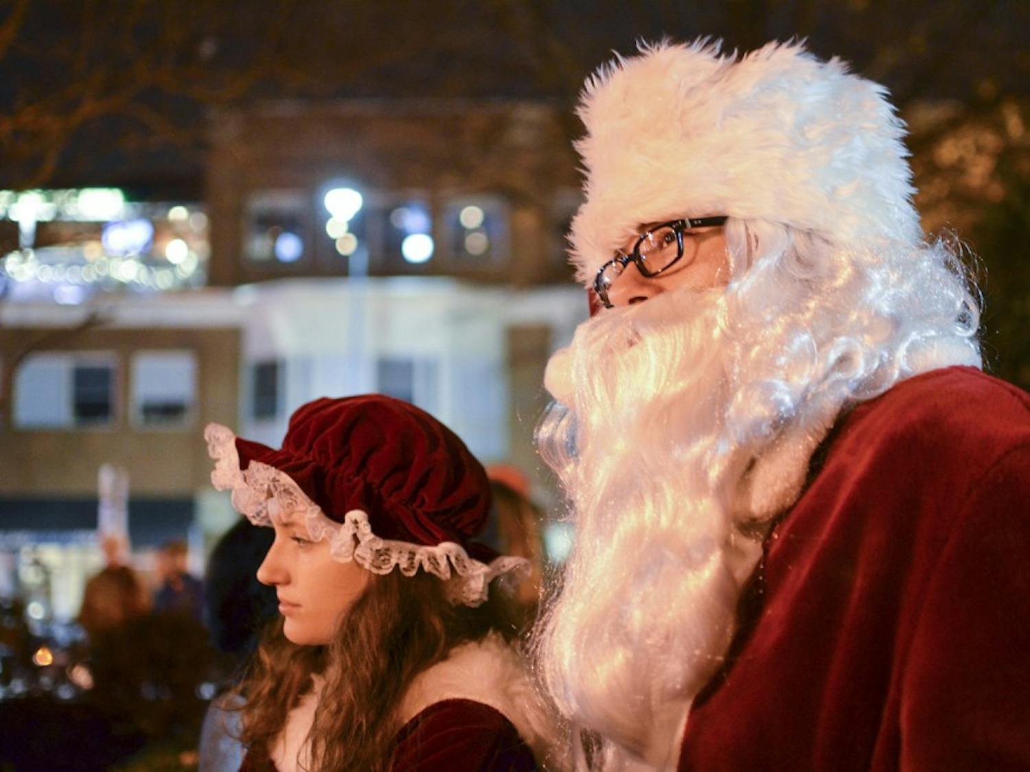 Santa Claus participates in the annual tree lighting ceremony at University Baptist Church on Sunday.