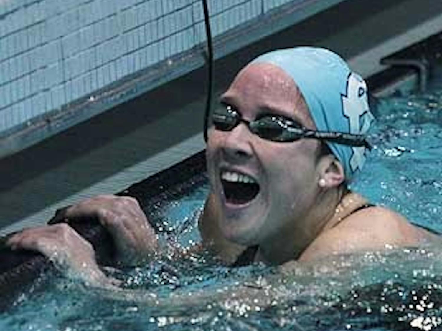 Sophomore Stephanie Peacock reacts to her ACC record time in the 500-yard freestyle. Thursday evening the Heels competed in the 2011 Janis Hape Dowd Nike Cup. Peacock broke the ACC record in the event with a time of 4:35.73. She was followed by teammates Kelsey Cummings in second and Jackie Rudolph in third.  