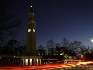The Morehead-Patterson Bell Tower stands after sunset on Friday, Feb. 19, 2021.