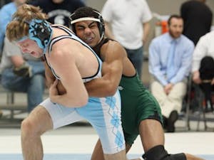 Wrestler Justin Dobies" along with Keegan Mueller registered his 100th career win this season and claimed victory Saturday against Ohio State.