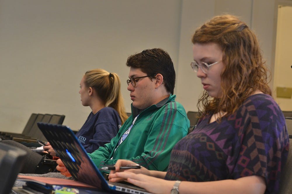 Saturday afternoon, Feb. 20, students gathered in Bingham for election protection training and to learn about primary polls. First-year Rebecca Price, sophomore Sebastian Hibbard, and junior Amanda Nunn sit among the other voters.