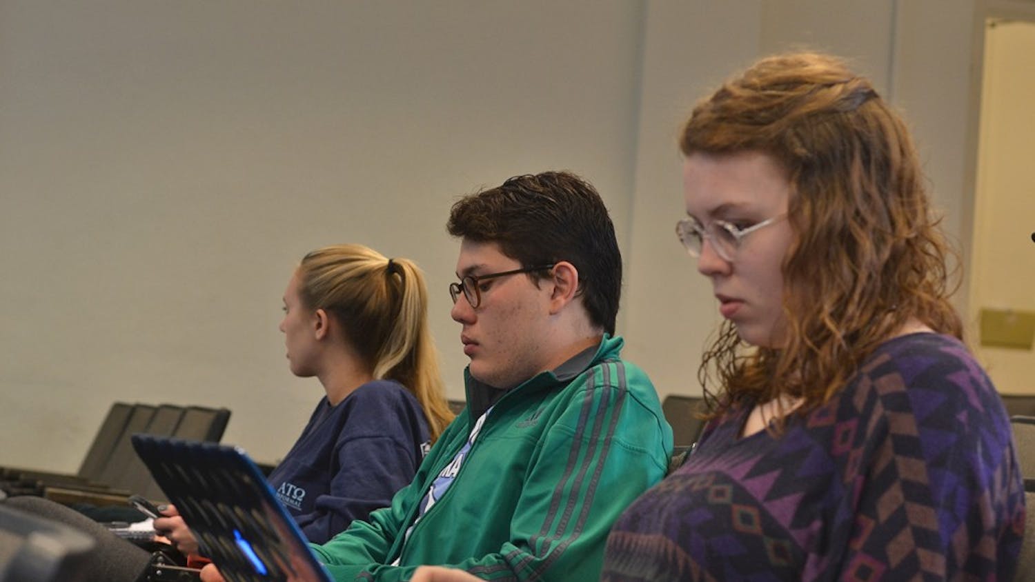 Saturday afternoon, Feb. 20, students gathered in Bingham for election protection training and to learn about primary polls. First-year Rebecca Price, sophomore Sebastian Hibbard, and junior Amanda Nunn sit among the other voters.