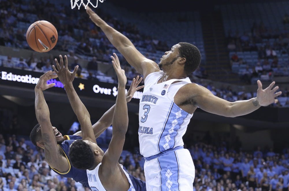 UNC forward Kennedy Meeks (3) goes up for a block against Chattanooga on Sunday.
