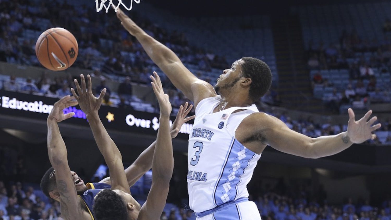 UNC forward Kennedy Meeks (3) goes up for a block against Chattanooga on Sunday.
