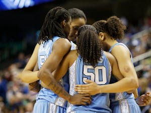 The Tar Heels huddle in the second half.