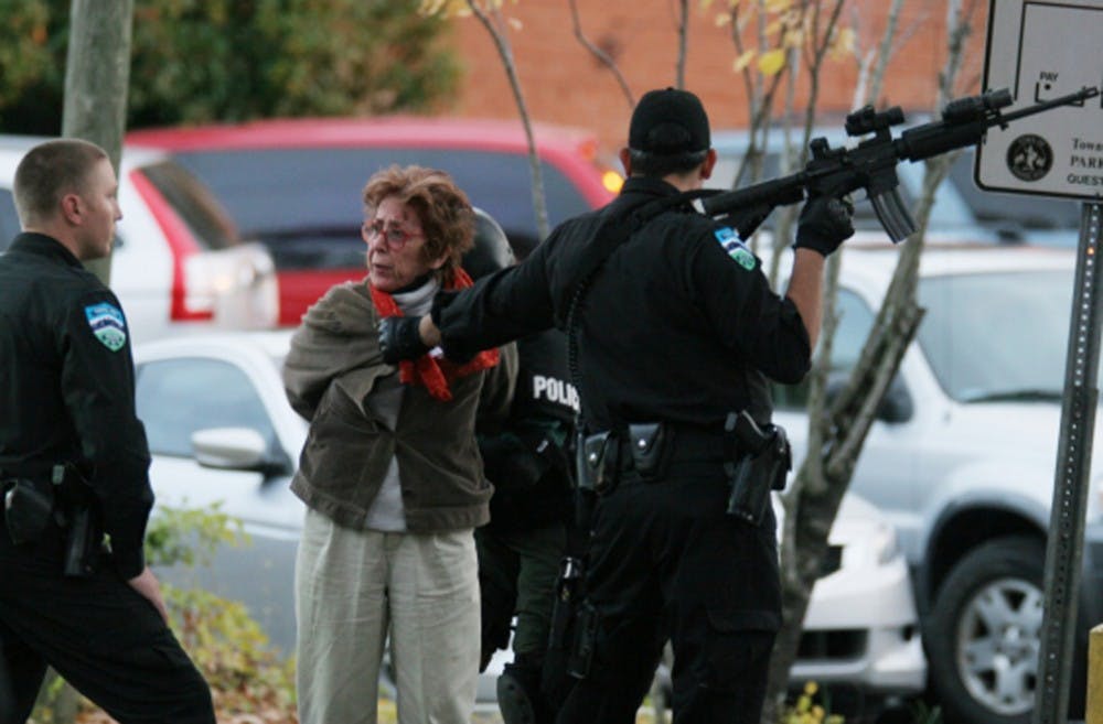 	<p>A woman was arrested by Chapel Hill police on November 13, 2011 in front of the old Chrysler Building on West Franklin Street.</p>
