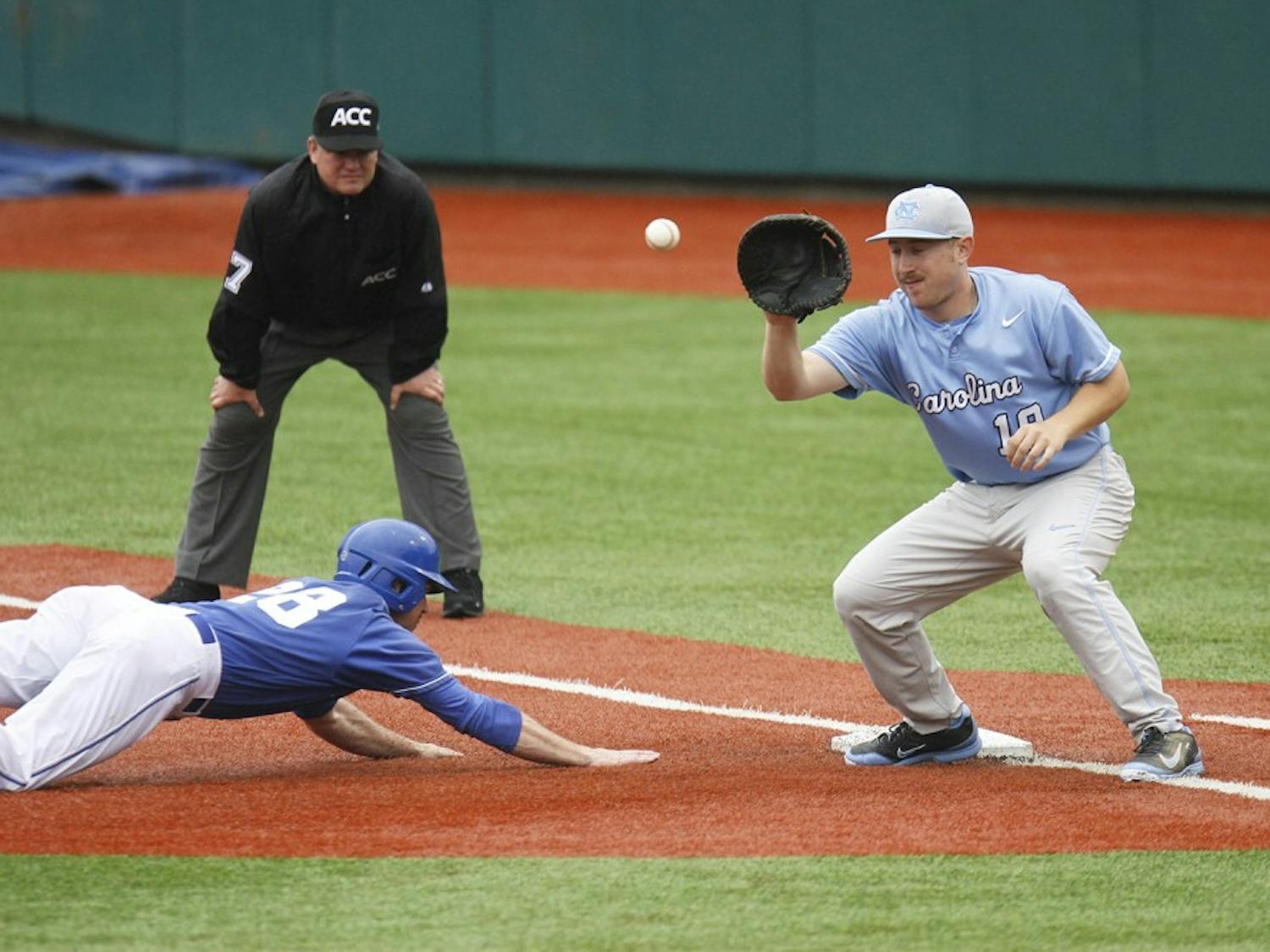 UNC first baseman Tom Zengel (19) tries to get a Duke player out. Carolina was defeated by the Blue Devils in their three game series 3-0 at Jack Coombs Field in Durham, NC. 