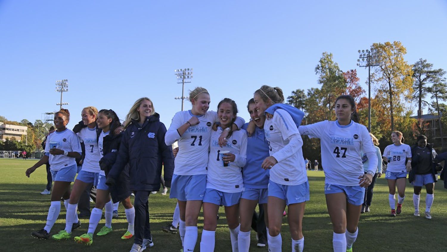 The UNC women's soccer team walks off the field in joy after defeating Clemson 1-0 in the third round of the NCAA tournament on Sunday.