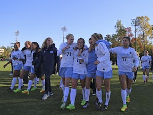 The UNC women's soccer team walks off the field in joy after defeating Clemson 1-0 in the third round of the NCAA tournament on Sunday.