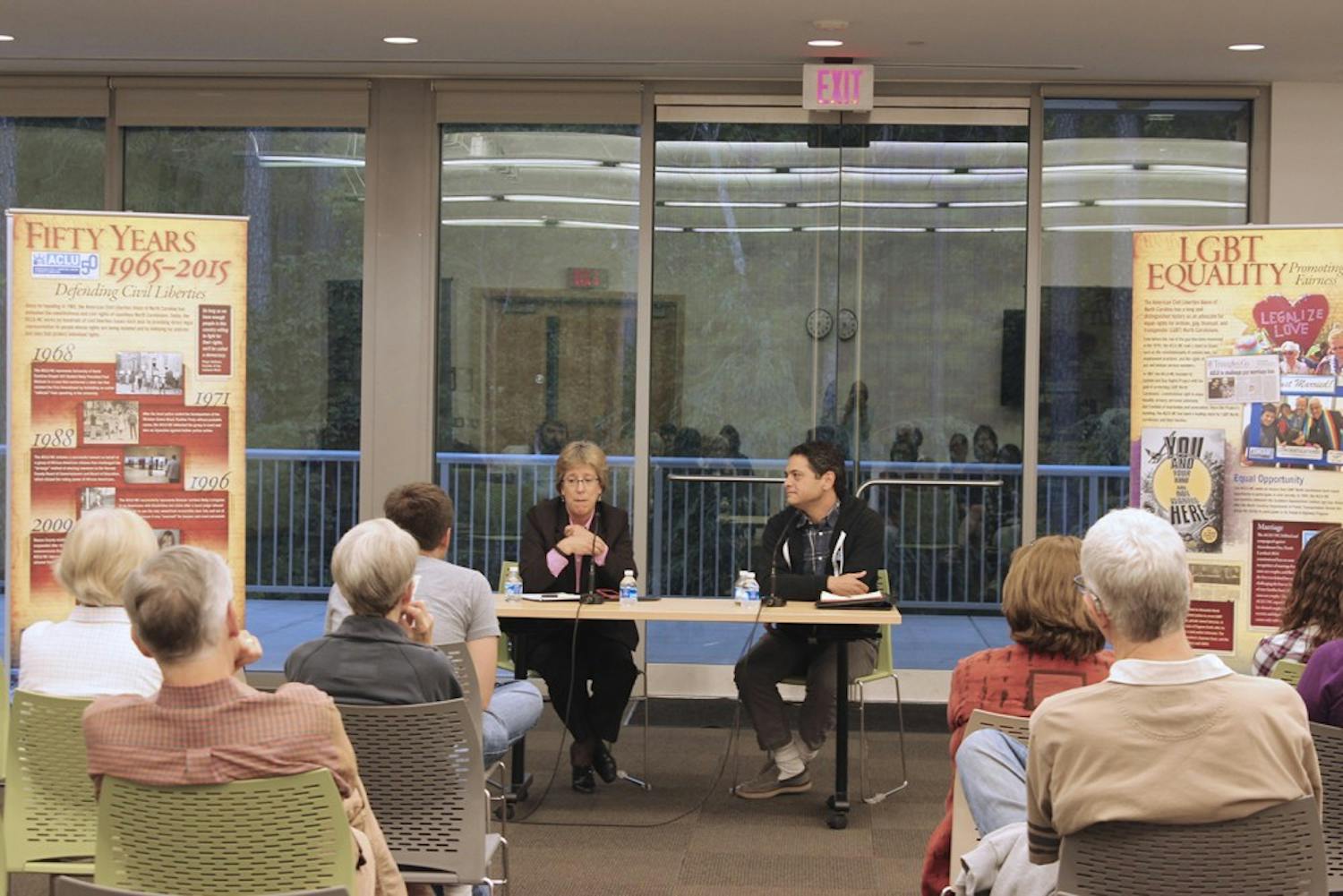 Chapel Hill mayor Mark Kleinschmidt and Carrboro mayor Lydia Lavelle host a panel discussion Monday evening at Mayor & Mayor: A Conversation about LGBTQ Struggles in North Carolina, part of the ACLU-NC 50th Anniversary Exhibit at the Chapel Hill Public Library.