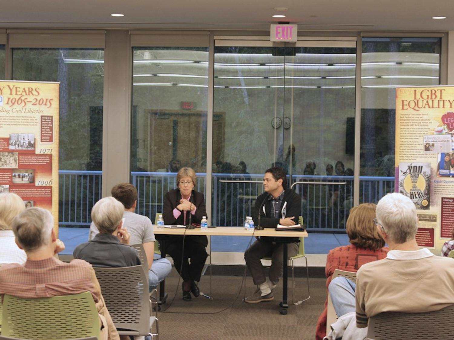 Chapel Hill mayor Mark Kleinschmidt and Carrboro mayor Lydia Lavelle host a panel discussion Monday evening at Mayor & Mayor: A Conversation about LGBTQ Struggles in North Carolina, part of the ACLU-NC 50th Anniversary Exhibit at the Chapel Hill Public Library.