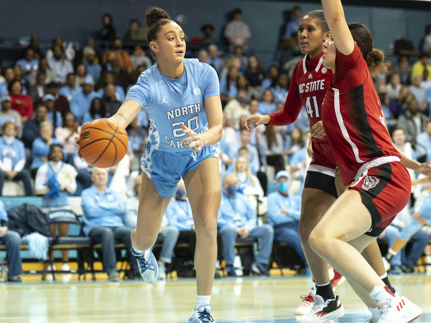 UNC sophomore forward Destiny Adams (20) passes the ball during the women's basketball game against N.C. State at Carmichael Arena on Sunday, Jan. 15, 2023. UNC beat N.C. State 56-47.