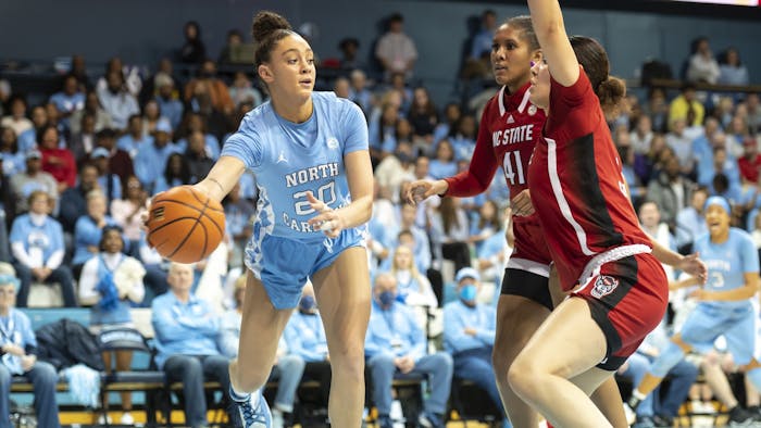 UNC sophomore forward Destiny Adams (20) passes the ball during the women's basketball game against N.C. State at Carmichael Arena on Sunday, Jan. 15, 2023. UNC beat N.C. State 56-47.