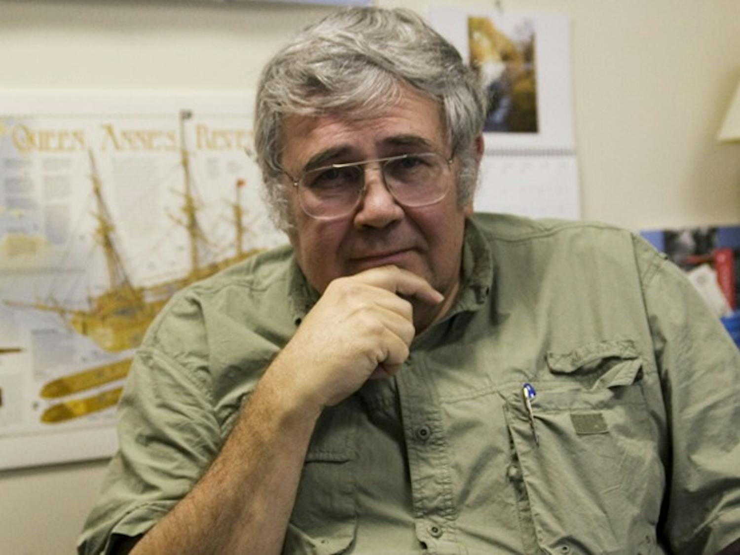 Professor Joe Caddell of the peace, war and defense department in his office. 
