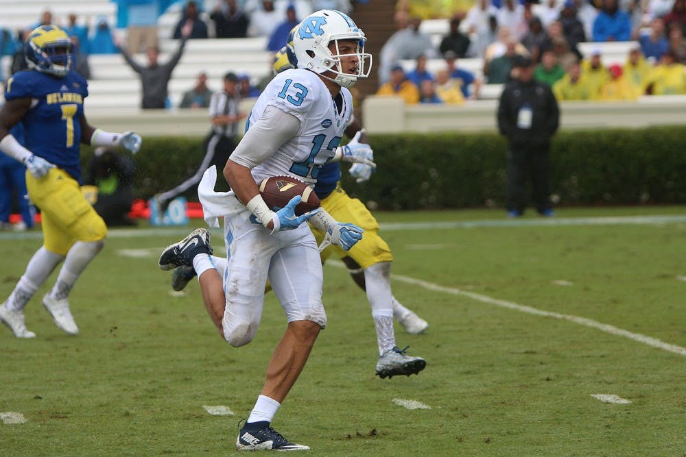 Wide receiver Mack Hollins (13) runs toward the end zone for a touchdown off of a 64 yard pass from Mitch Trubisky. 