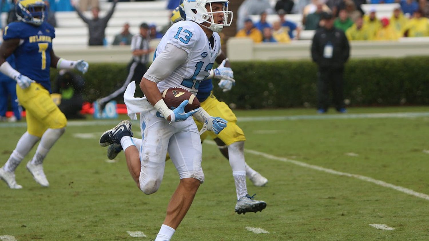 Wide receiver Mack Hollins (13) runs toward the end zone for a touchdown off of a 64 yard pass from Mitch Trubisky. 