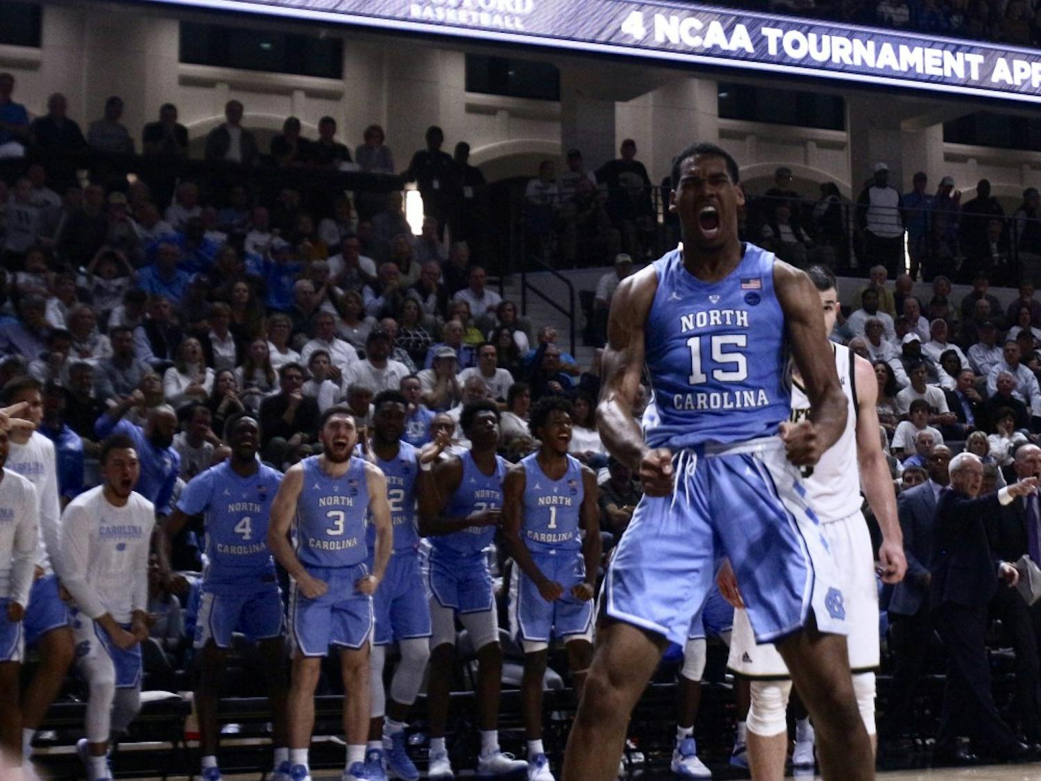 UNC power forward Garrison Brooks (15) screams in the excitement following his slam dunk against Wofford in their first game of the season. UNC won 78-67 in the Richardson Indoor Stadium, Spartanburg, SC on Nov. 6, 2018. 