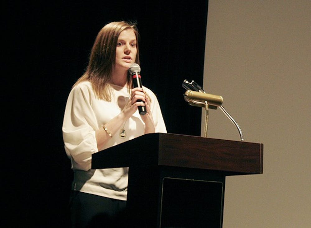 	<p>Laurie Graham, programs director at the Orange County Rape Crisis Center, explains the forum for sexual assault victims on Tuesday night.</p>