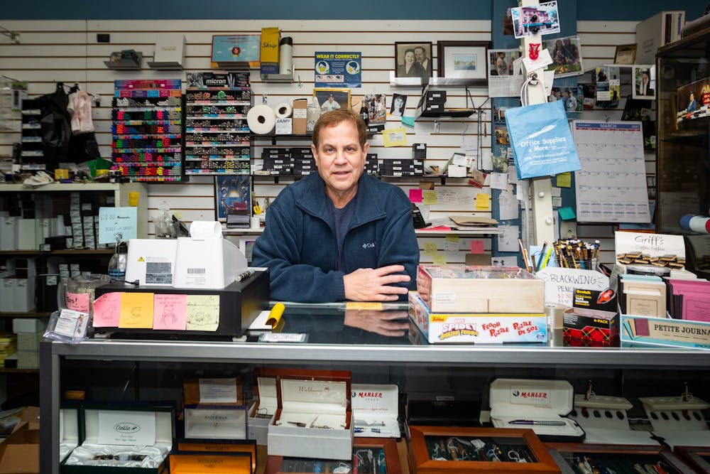 <p>Alan Cohen, owner of Crazy Alan's Emporium, leans on the checkout counter of his store in Chapel Hill, N.C., on Wednesday, March 15, 2023. Crazy Alan's Emporium is an office supplies store that has been in business for over 20 years.</p>