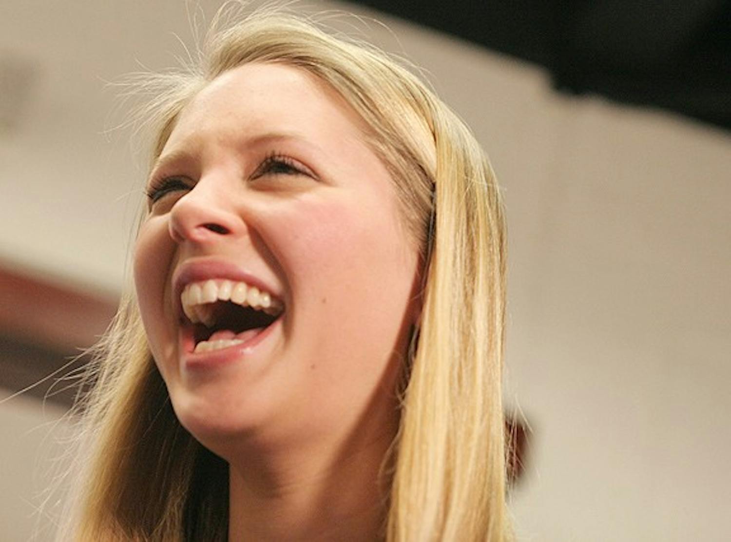 Eve Carson, the 2008 UNC Student Body President, laughs in a photo.