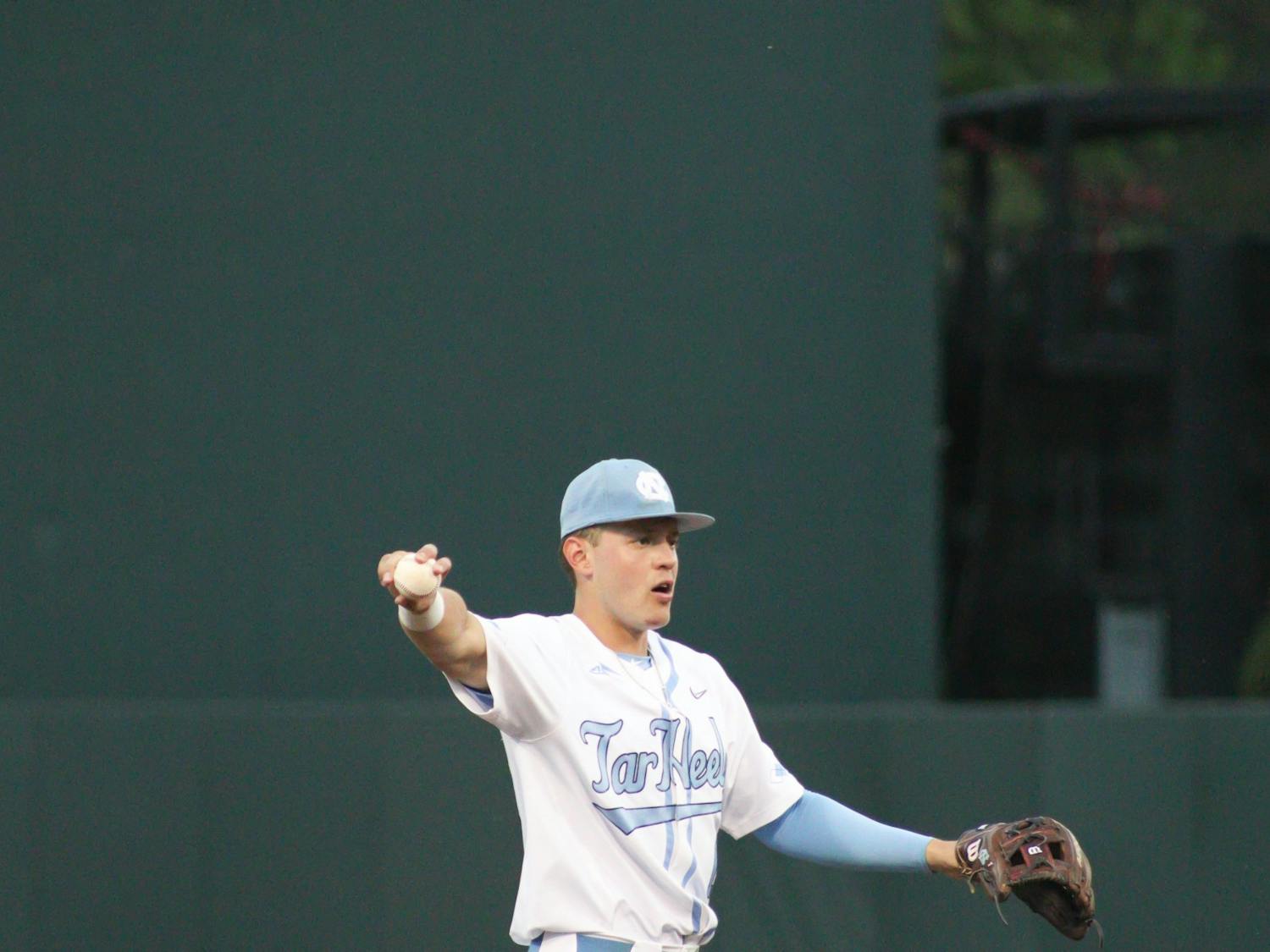 Shortstop Danny Serretti (1) calls out after catching an outfield ball during a baseball game against North Carolina A&amp;T. UNC lost 6-7 at home on Tuesday, April 12, 2022.