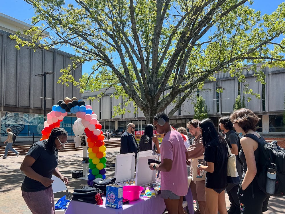 <p>UNC students and staff celebrate Pride in the Pit with the LGBTQ Center on Tuesday, April 11, 2023. The event — part of University Pride Week — included various activities, giveaways and resource information.&nbsp;</p>
