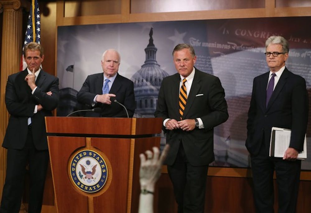 <p>(L-R) Senators Jeff Flake (R-AZ), John McCain (R-AZ), Richard Burr (R-NC) and Tom Coburn (R-OK) participate in a news conference about veterans affairs on Capitol Hill, June 3, 2014 in Washington, DC. (Photo by Mark Wilson/Getty Images)</p>
