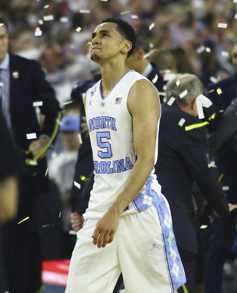 <p>Senior Marcus Paige (5) walks off the court after a buzzer beater 77-74 loss to Villanova. Paige had made a three-pointer to briefly tie the game.</p>