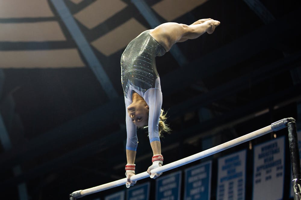 UNC freshman Elizabeth Culton competes in the uneven bars during a meet against University of Pittsburgh's gymnastics team at Carmichael Arena on Saturday, Jan. 25, 2020. Culton won first place overall with a total score of 38.875.