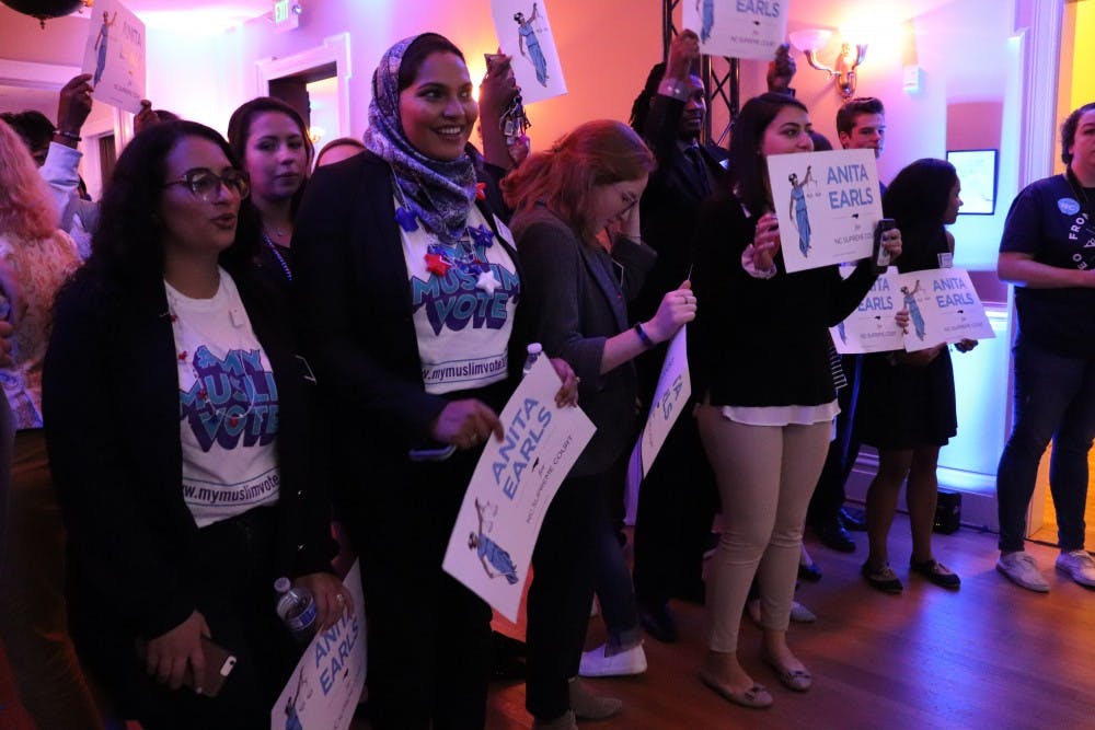 Supporters of newly elected NC Supreme Court Associate Justice Anita Earls anticipate her arrival at the election night party for the Democratic party on Tuesday, Nov. 6 at the Democratic Headquarters in Raleigh. 
