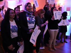 Supporters of newly elected NC Supreme Court Associate Justice Anita Earls anticipate her arrival at the election night party for the Democratic party on Tuesday, Nov. 6 at the Democratic Headquarters in Raleigh. 