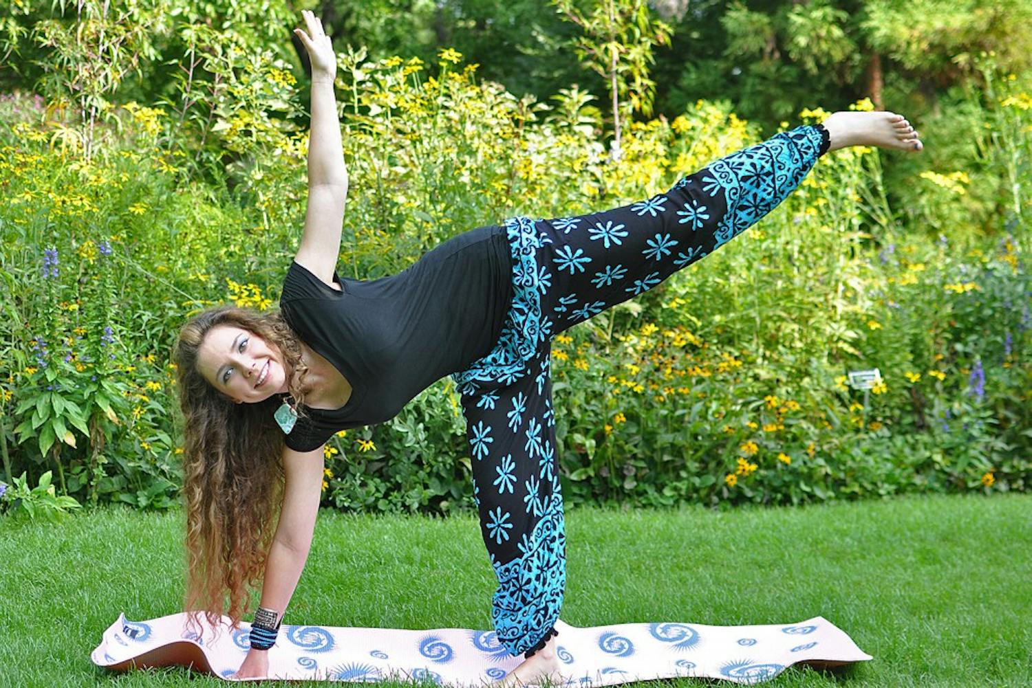 Kamaira Philips is the founder, president and treasurer of Mind, Body, Spirit Connection, a social and wellness organization at UNC. Philips is leading a community yoga class in the Coker Arboretum at 2 p.m. on Friday.