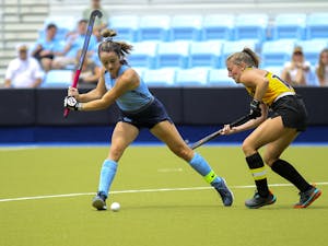 UNC senior forward Erin Matson (1) makes a pass during a field hockey game against Appalachian State on Sunday, Aug. 14, 2022.
