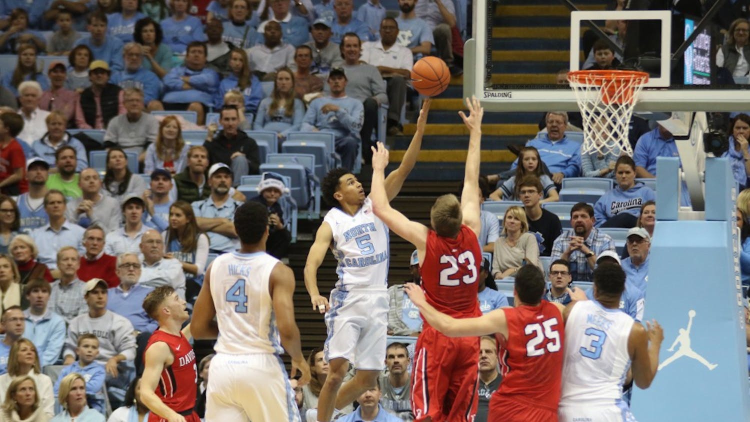 Guard Marcus Paige (5) lays the ball in during UNC's 98-65 route of Davidson.